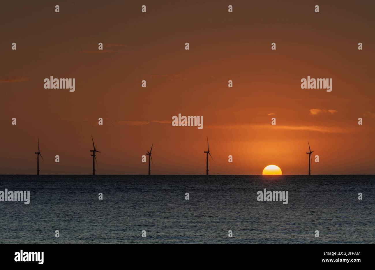 Wind turbines in sea - Stock Image