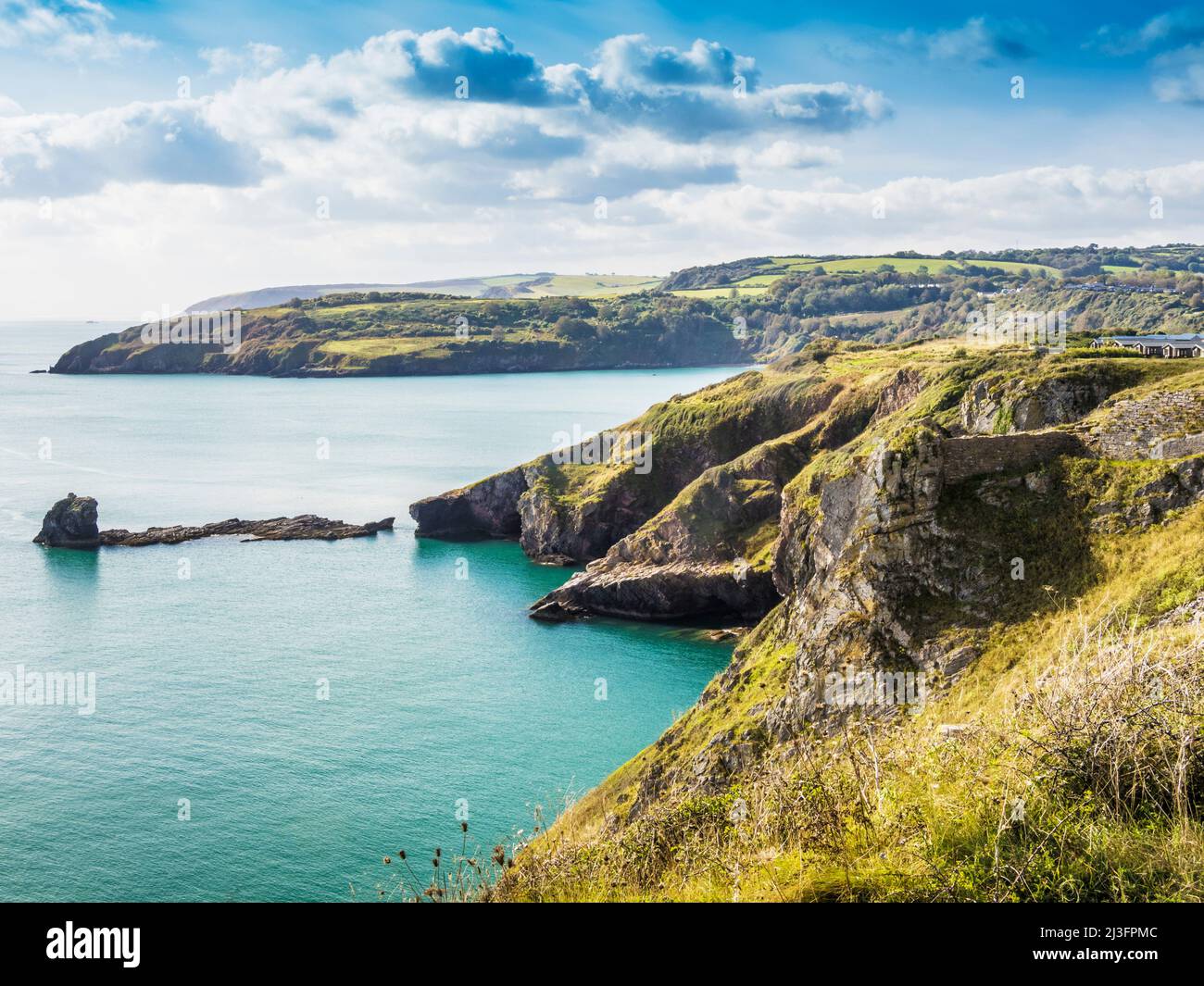 View from the South West Coast Path towards St. Mary's Bay and Sharkham Point near Brixham, Devon. Stock Photo