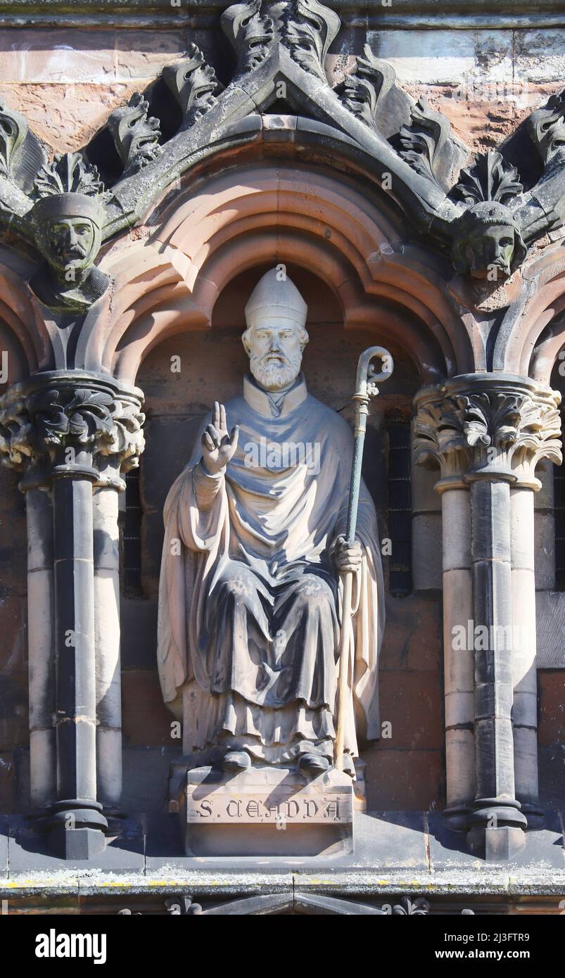Statue of Saint Ceadda, or Chad Bishop of the Mercians on the west front of Lichfield Cathedral, Staffordshire, England Stock Photo