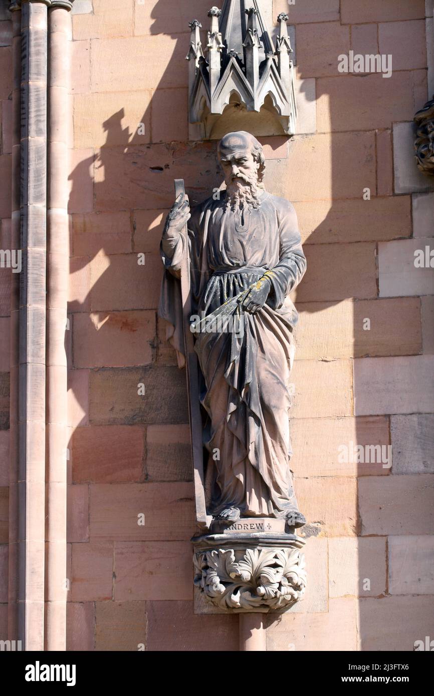 Statue of the Apostle Saint Andrew on the west front of Lichfield Cathedral, Staffordshire, England Stock Photo