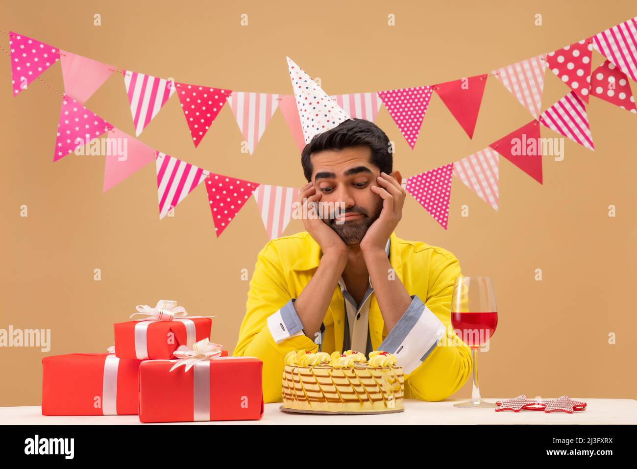 Man party hat sad hi-res stock photography and images - Alamy