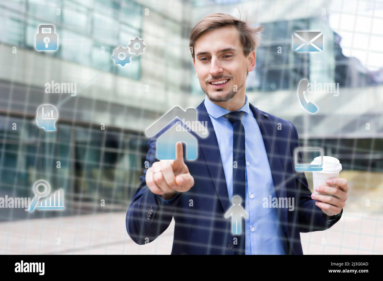 Man pressing icons on virtual touchscreen Stock Photo