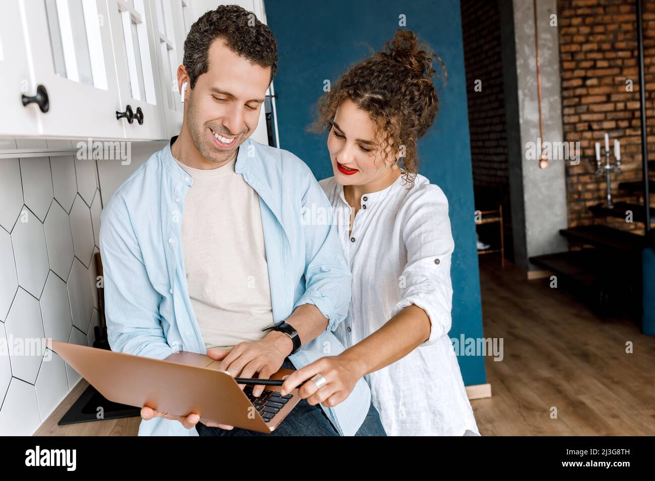 Successful stylish business partners working on project in modern ...
