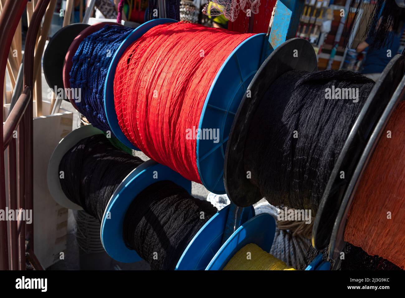 Multi-colored rope pulleys on the shop. Stock Photo