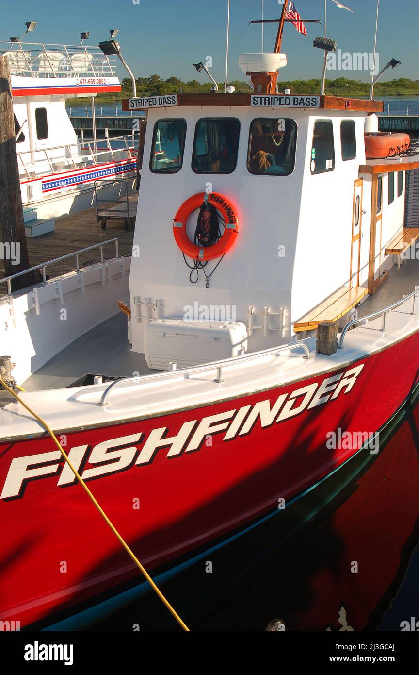 A charter fishing boat aptly named Fishfinder is tied to the docks in A charter fishing boat aptly named Fishfinder is tied to the docks in