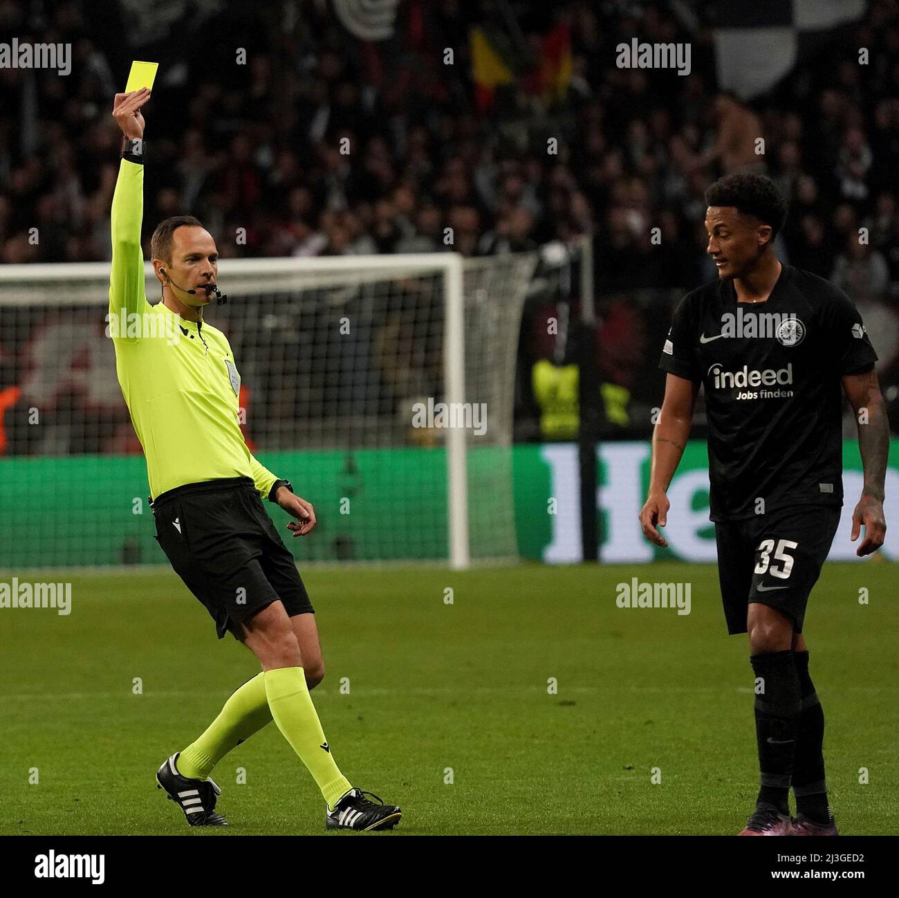 April 7th, 2022, Deutsche Bank Park, Frankfurt, Euroleague, Eintracht  Frankfurt vs FC Barcelona, in the picture referee Srdjan Jovanovic shows  Tuta (Frankfurt) the first yellow card Stock Photo - Alamy