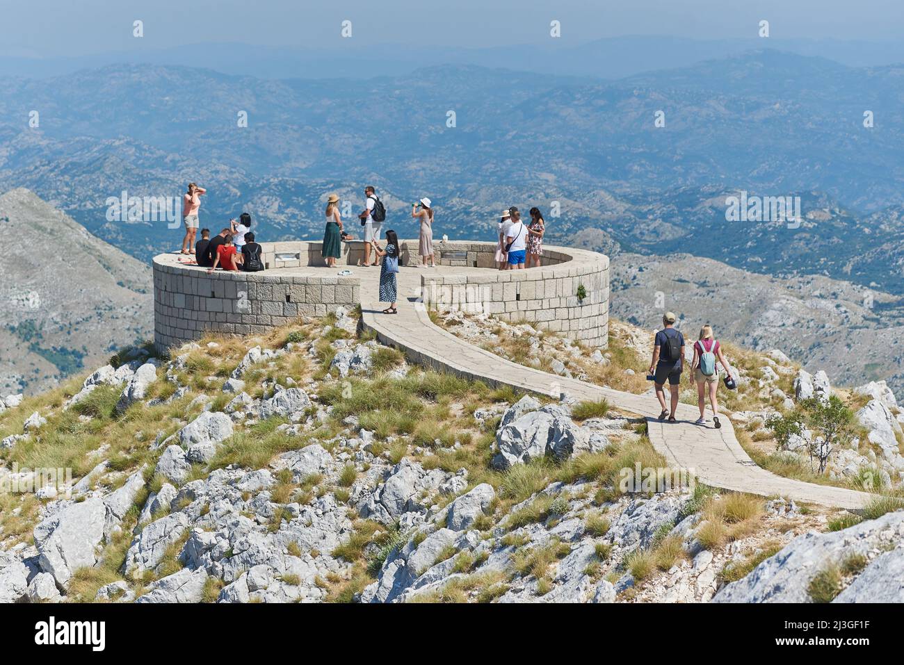 CETINJE, MONTENEGRO - JULY 23, 2021: Tourists came to the viewpoint of Lovcen National Park Stock Photo