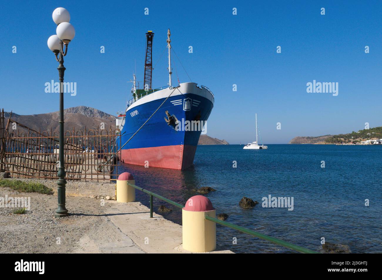 Ship docked in Lakki harbour, Leros Island, Dodecanese Islands, Greece Stock Photo