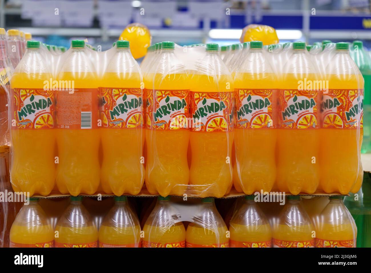 Tyumen, Russia-March 25, 2022: Orange flavored carbonated soft drinks from brands of Mirinda on the shelves of hypermarkets. Stock Photo