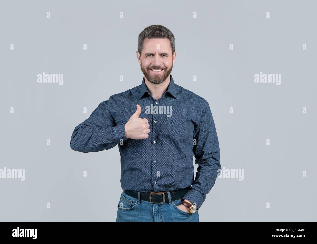 Showing approval or satisfaction. Happy man give thumbs up. Approval concept. Approved Stock Photo