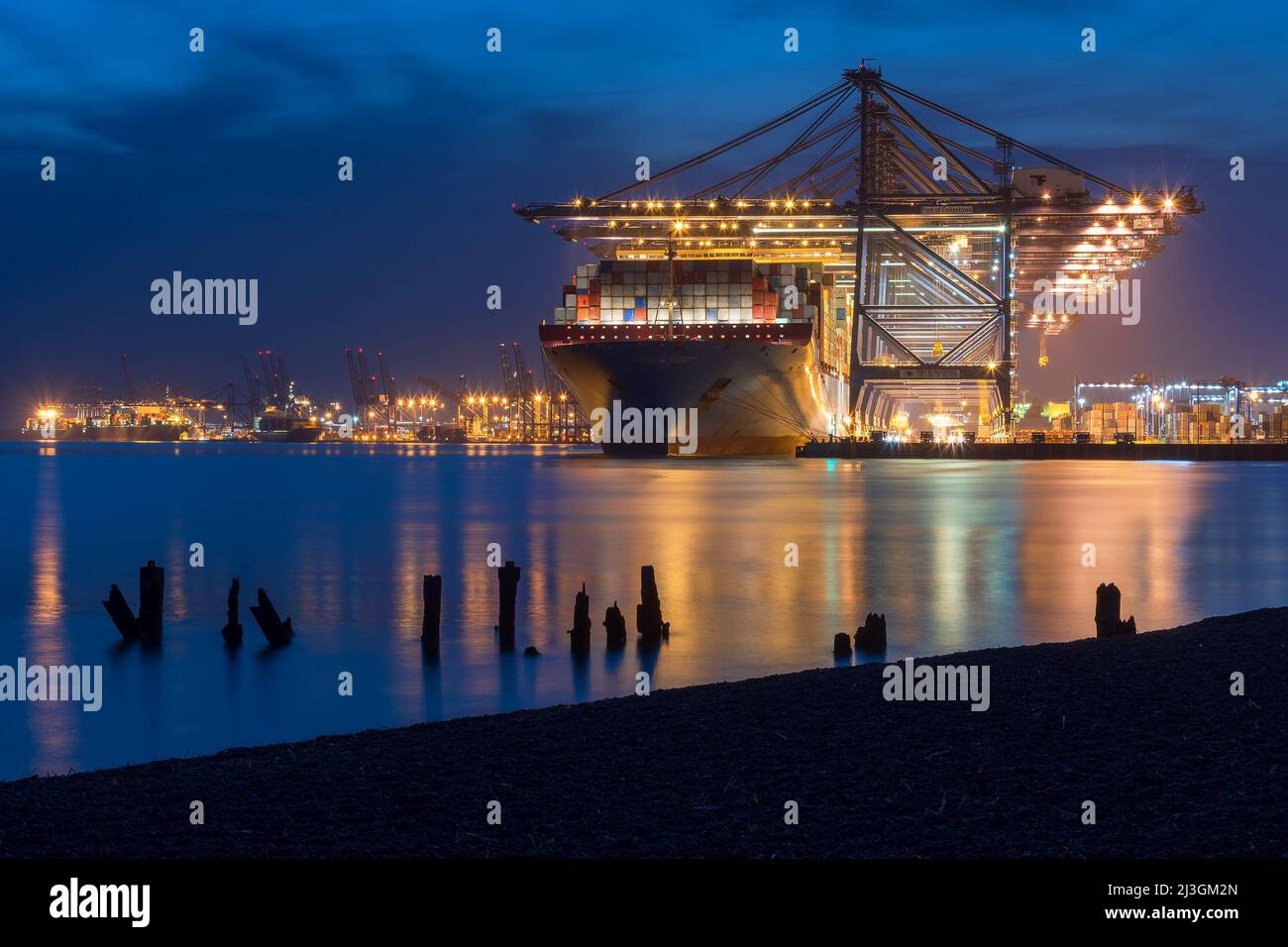 The Triple E class Ultra Large container carrier Matz Maersk (Maersk Line) loading operations at the port of Felixstowe - June 2017. Stock Photo