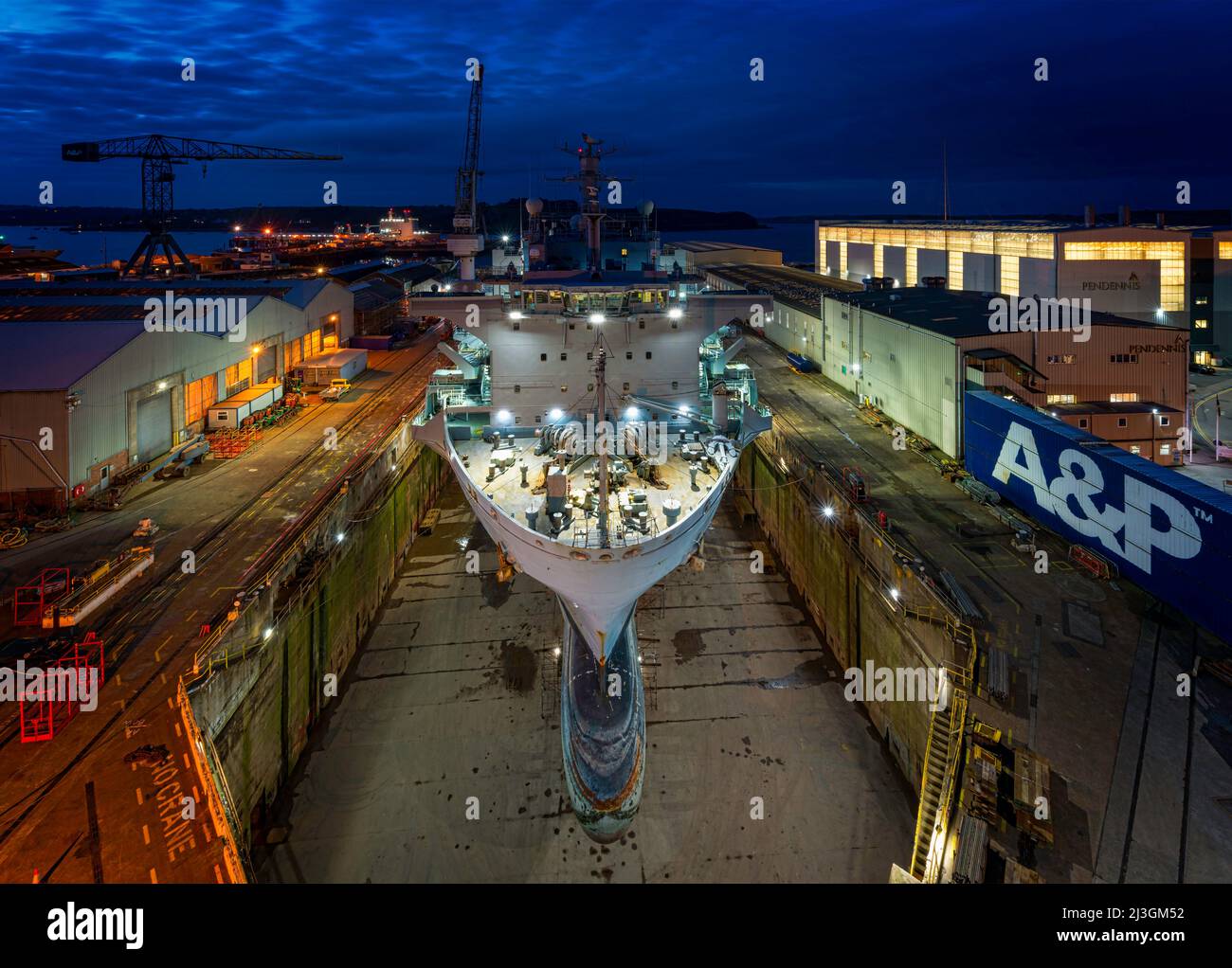 A night floodlit view of the Royal Fleet Auxiliary hospital ship RFA Argus in dry dock at the A&P facility in Falmouth, Cornwall - March 2018. Stock Photo