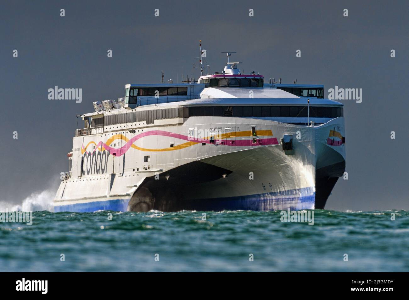 The trimaran Condor Liberation operates a high-speed ferry link between the UK mainland and the Channel Islands, Jersey and Guernsey - September 2020. Stock Photo