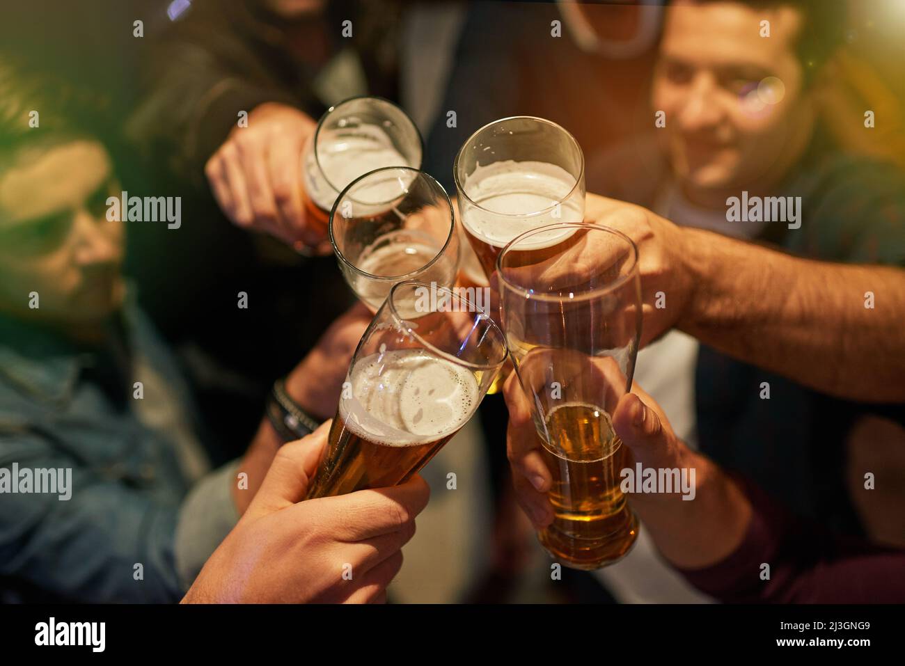 Boys Night High Angle Shot Of Guys Toasting With Beers At A Party Stock Photo Alamy Boys Night High Angle Shot Of Guys Toasting With Beers At A Party Stock Photo Alamy