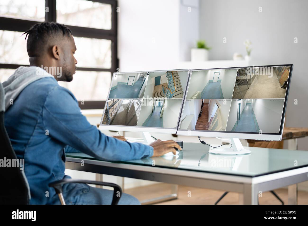 CCTV Security Footage On Multiple Computer Monitors Stock Photo Alamy