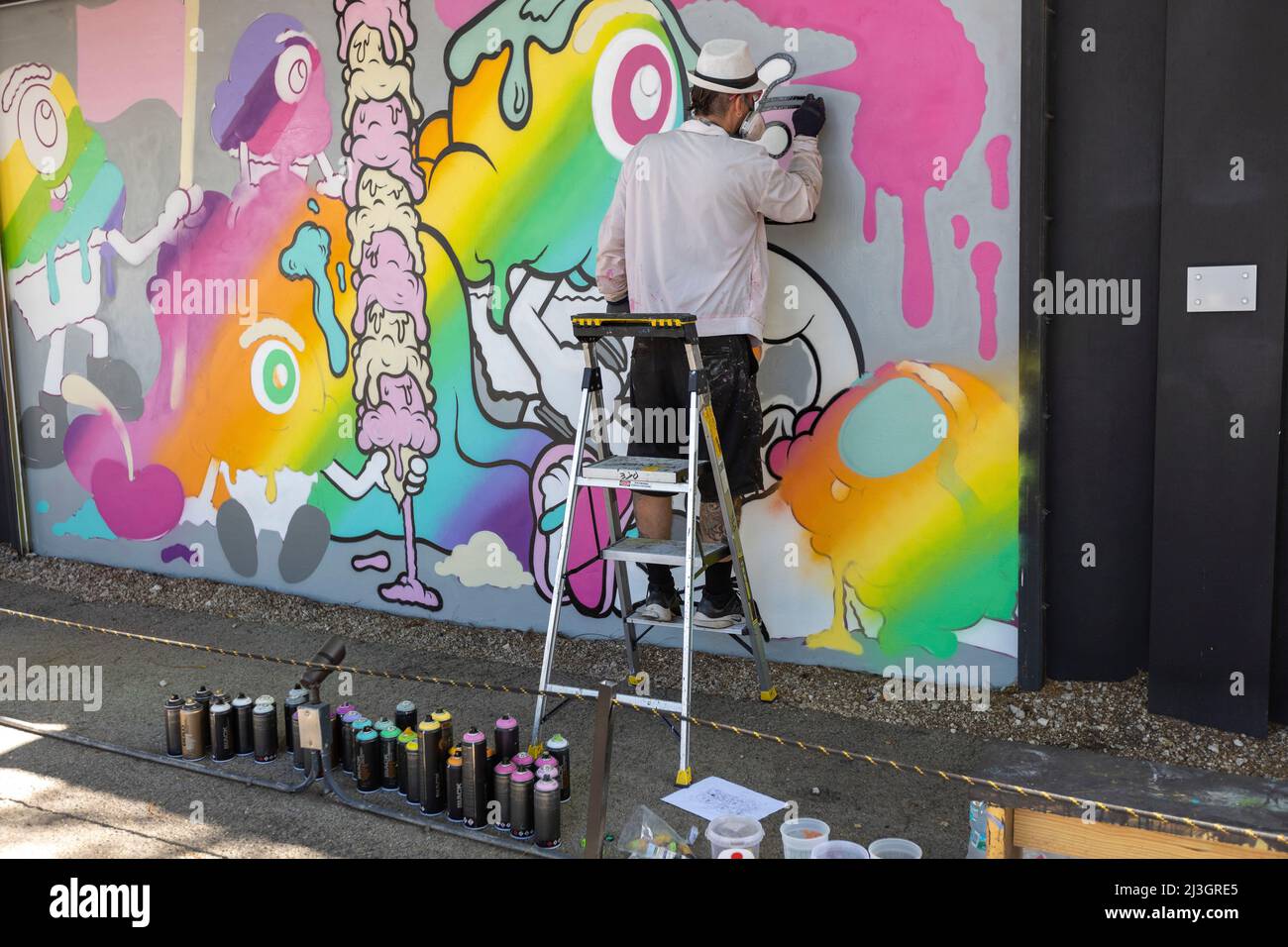 United States, Florida, Miami, artist creating a mural in the Wynwood walls, Wynwood district Stock Photo