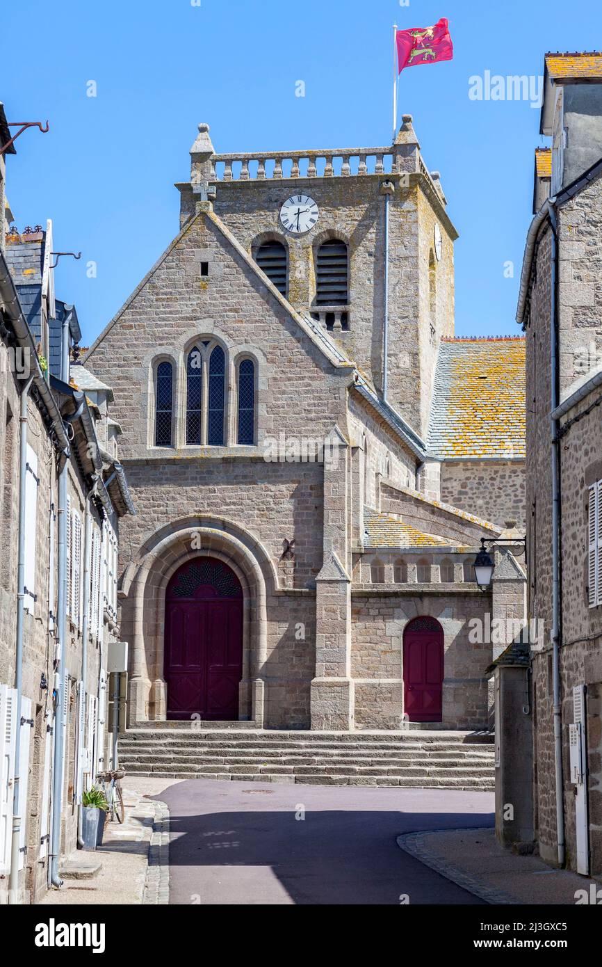 France, Manche, Cotentin, Barfleur, labeled Les Plus Beaux Villages de France, Saint-Nicolas church with Normandy flag Stock Photo