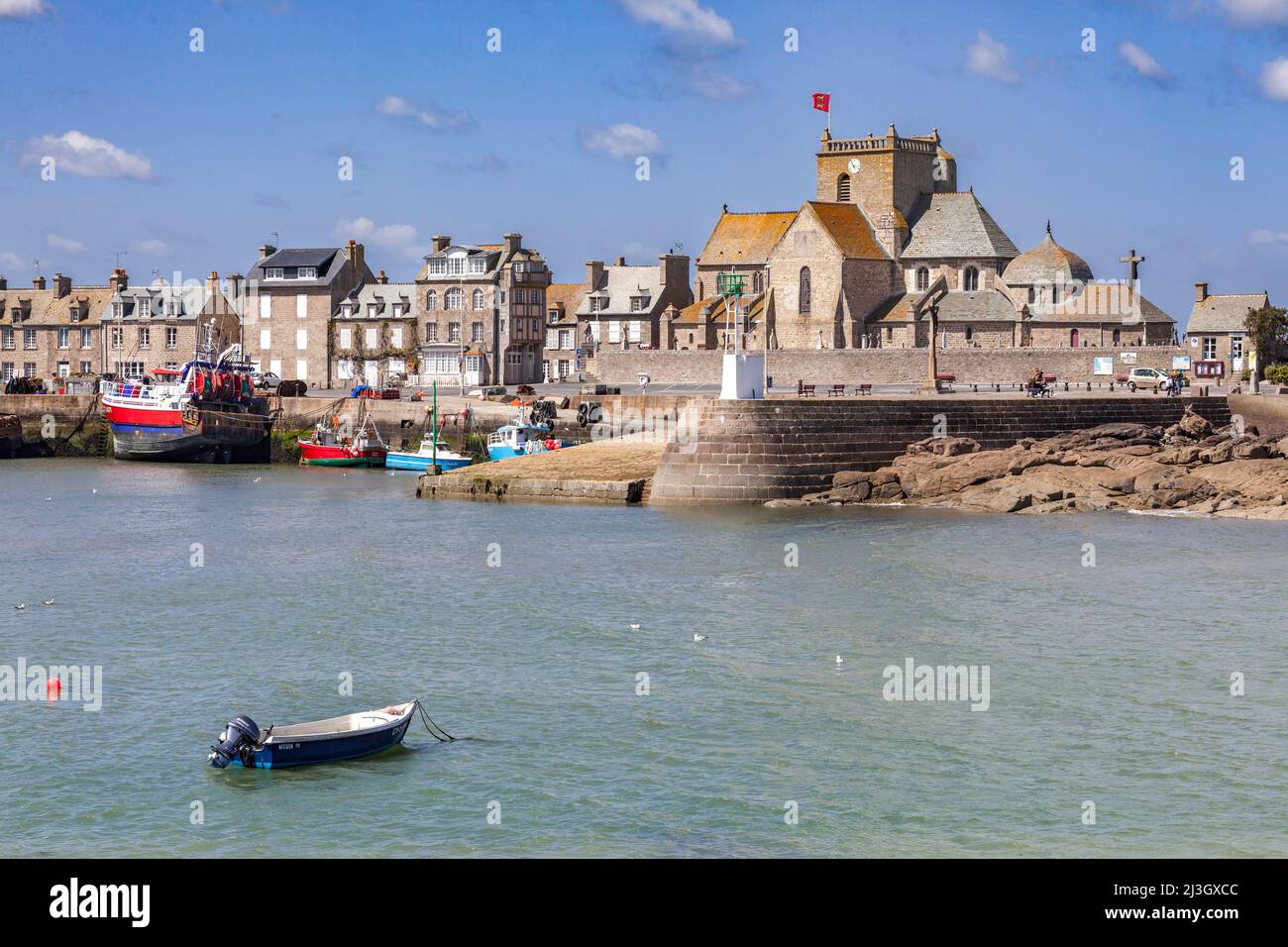 France, Manche, Cotentin, Barfleur, labeled The Most Beautiful Villages of France, fishing and beaching harbour and Saint-Nicolas church Stock Photo