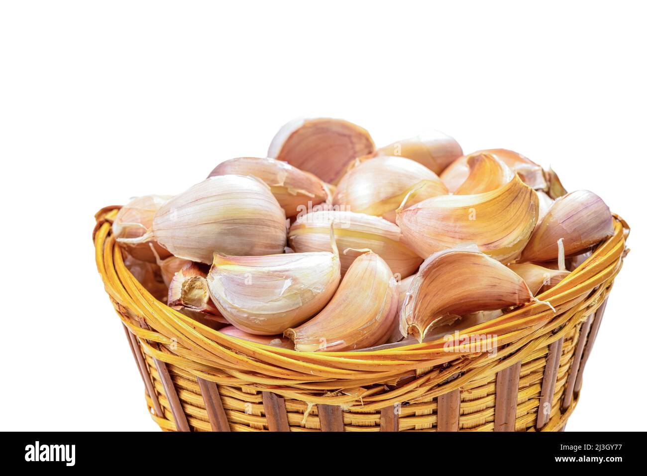 Whole garlic cloves in a white background. Stock Photo