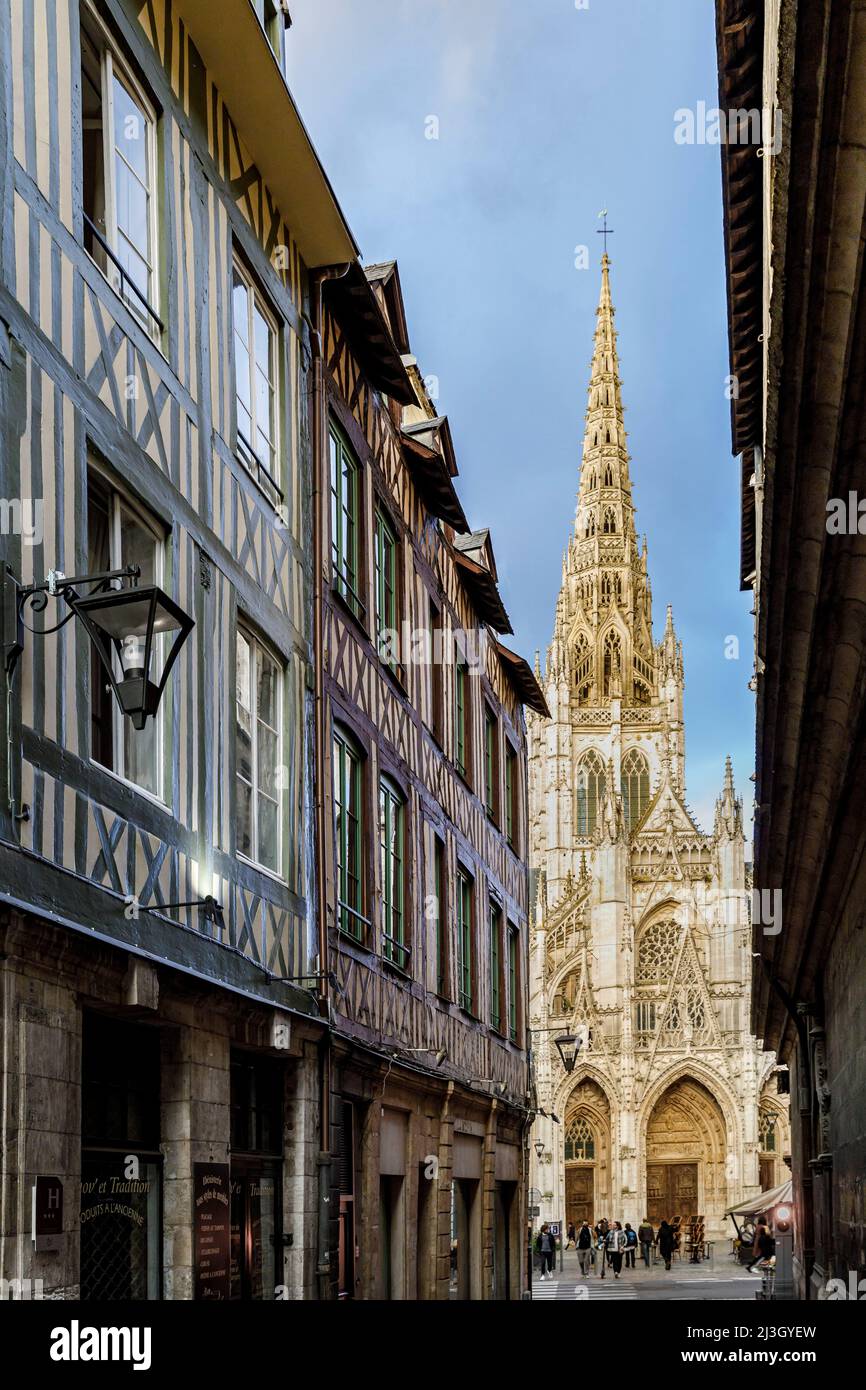 France, Seine-Maritime (76), Rouen, view of the Saint-Maclou church from rue Saint-Romain, pedestrian street bordered by the archbishopric of Notre-Dame cathedral on one side and, opposite, by half-timbered houses dating from medieval times Stock Photo