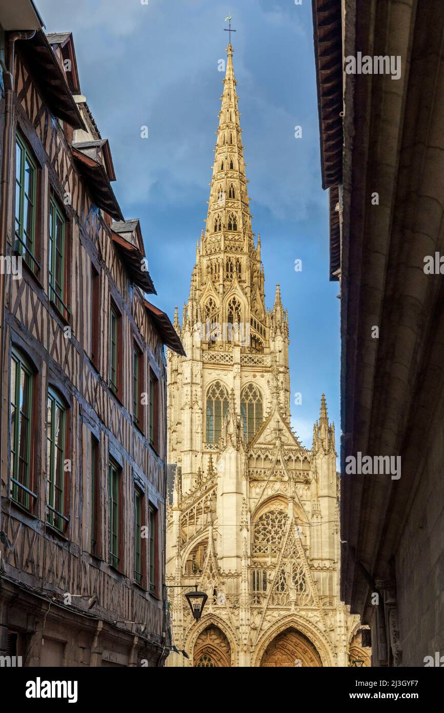 France, Seine-Maritime (76), Rouen, view of the Saint-Maclou church from rue Saint-Romain, pedestrian street bordered by the archbishopric of Notre-Dame cathedral on one side and, opposite, by half-timbered houses dating from medieval times Stock Photo