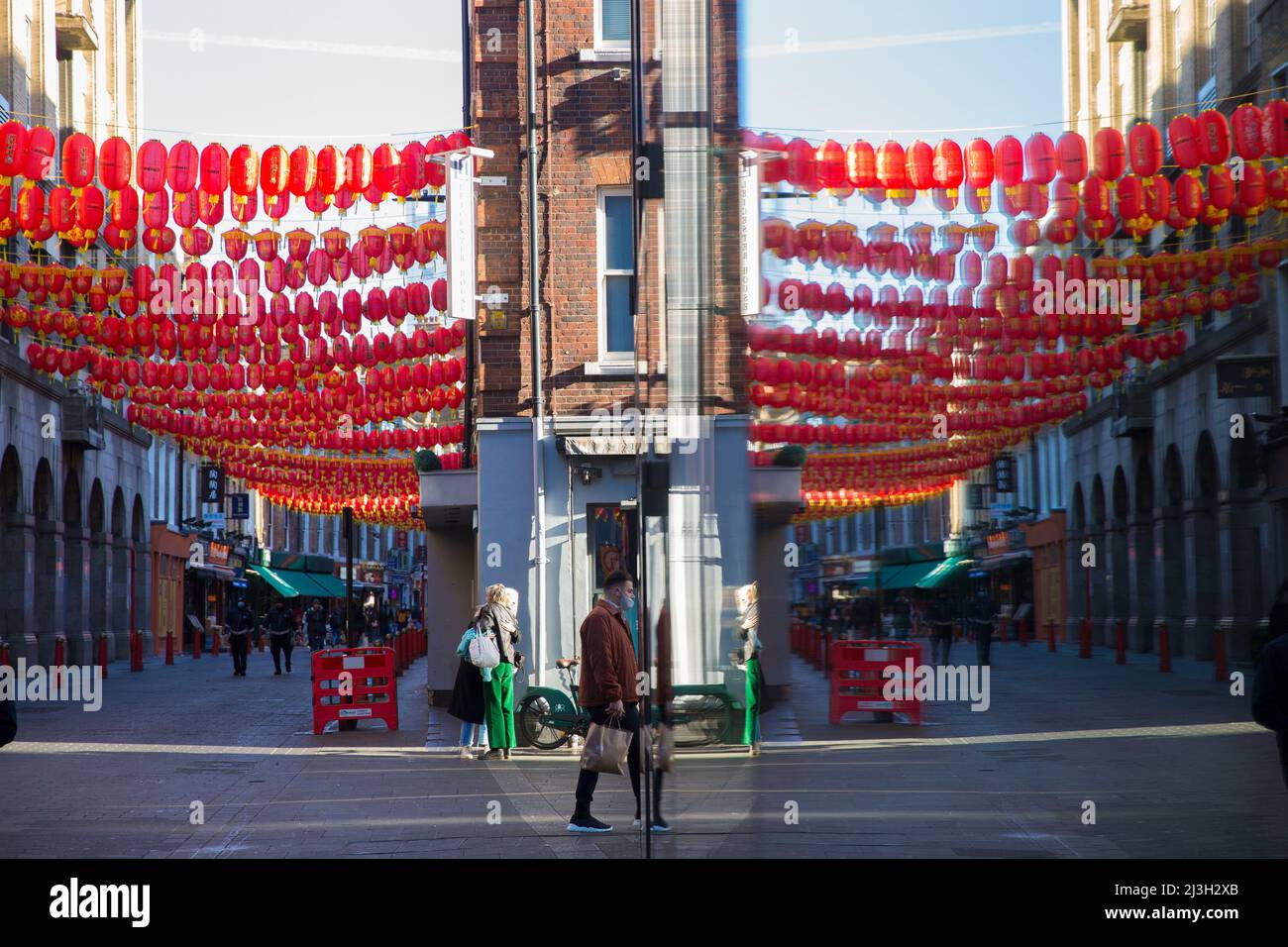 People stroll in Chinatown, central London as the Lunar New Year falls on 1 February this year. Stock Photo