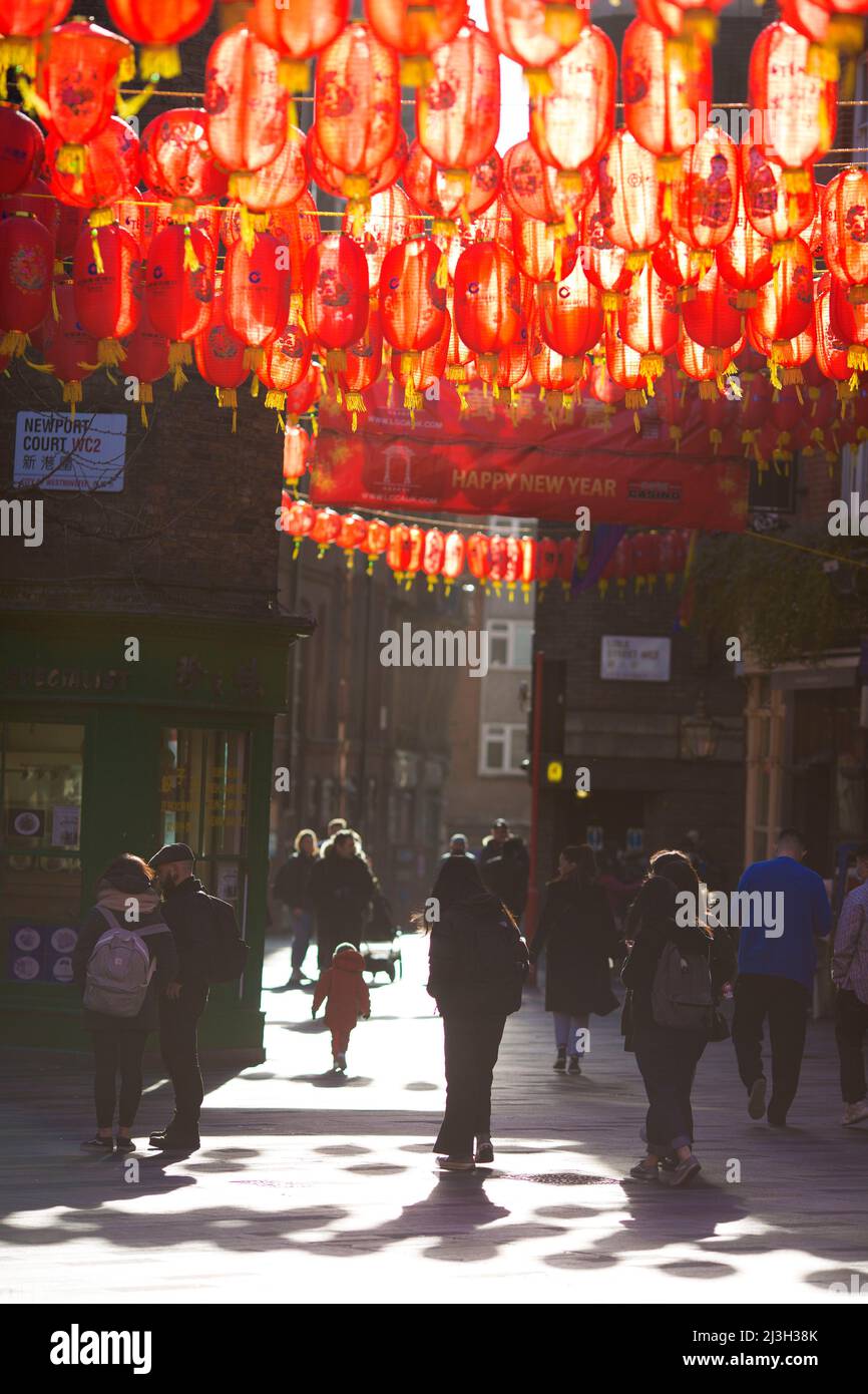 People stroll in Chinatown, central London as the Lunar New Year falls on 1 February this year. Stock Photo