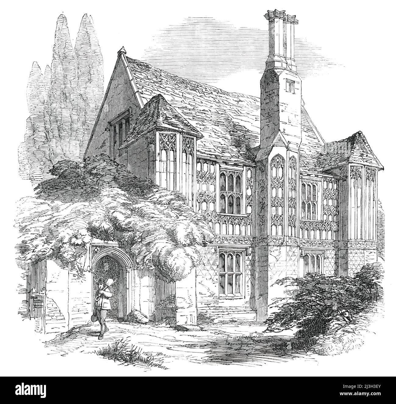 Cressingham Manor-House, 1850. 'This house, which is situated about five miles from Swaffham, in Norfolk, is remarkable for the fact that its exterior is entirely coated with tracery formed in whitish terra cotta. It was probably constructed at the latter end of the fifteenth century, when the family of the Jepsons were the possessors of the place...[it is an] interesting example of the skill of our ancestors in the manufacture of moulded bricks...The whole edifice, no doubt, anciently was surmounted by a battlement and parapet; this has entirely disappeared, but I was shown a portion of a Tud Stock Photo