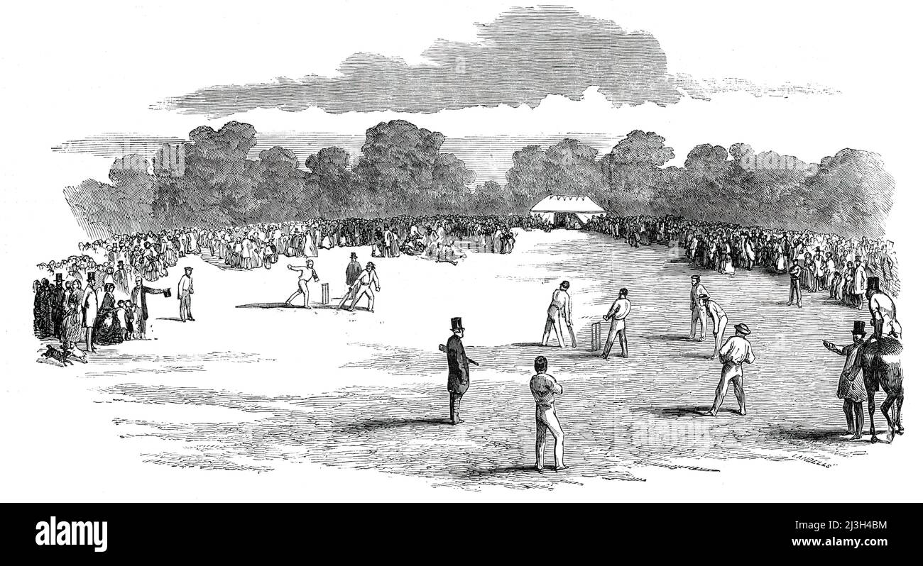 Visit of the Royal Party to the Cricket-Ground, at Castle Howard, 1850. Queen Victoria and Prince Albert watch a game of cricket as guests at Castle Howard in north Yorkshire. The royal party '...witnessed for some time the play of the Castle Howard Club. The Earl of Carlisle is particularly fond of this game; and the spot devoted to it in the park, being surrounded by an amphitheatre of noble trees, and ornamented by flags and tents, has a very pleasing appearance'. From &quot;Illustrated London News&quot;, 1850. Stock Photo