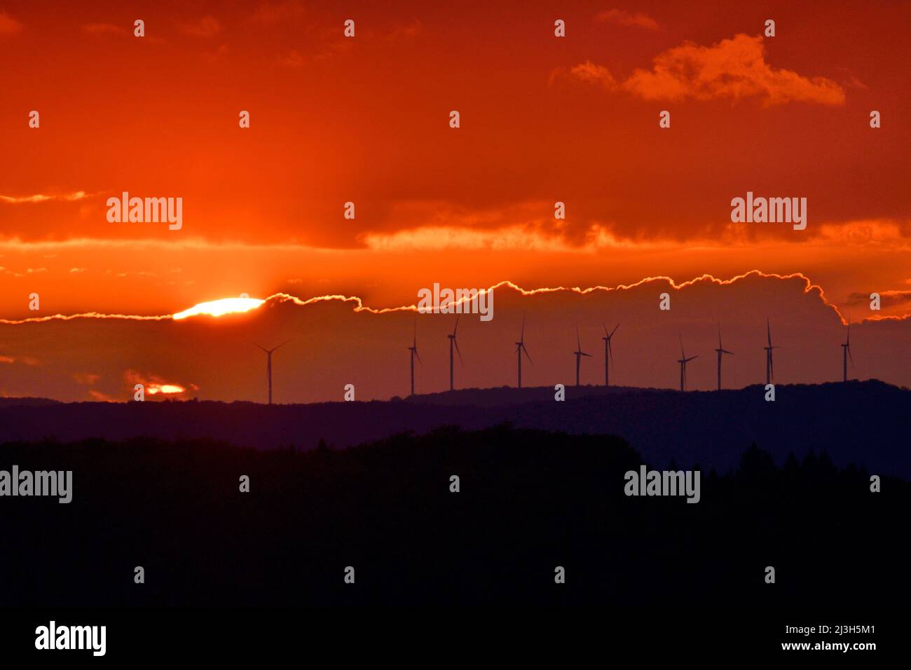 France, Doubs, Lomont massif, wind turbines, sunset Stock Photo