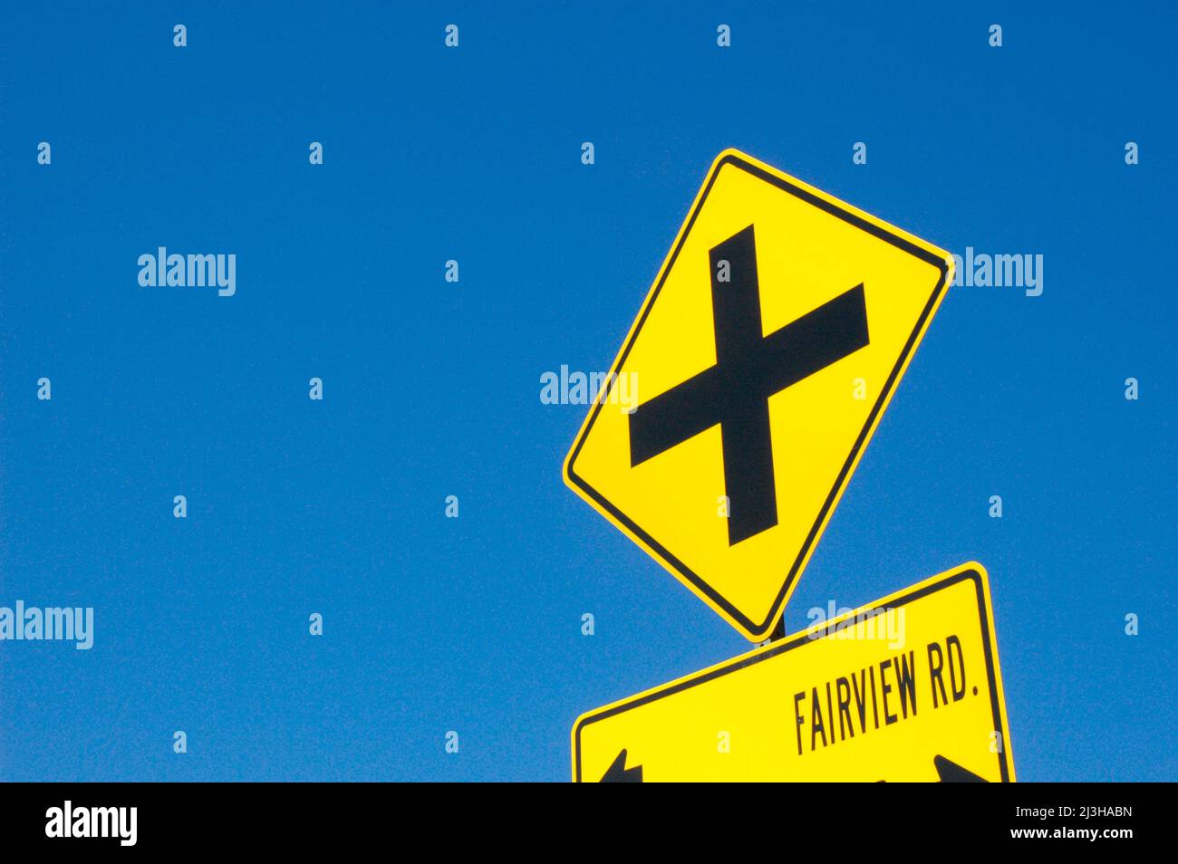 cross roads ahead signs for drivers to see on freeway and roads and