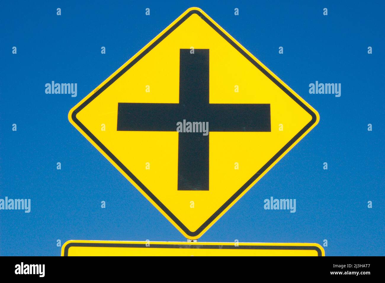 cross roads ahead signs for drivers to see on freeway and roads and
