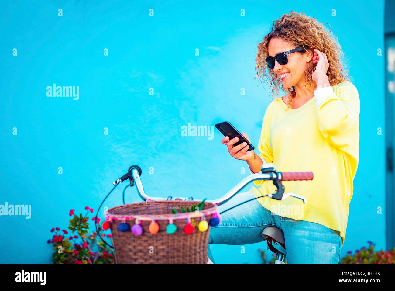 Portrait, woman, attractive, bike, sit, phone, hold, Stock Photo