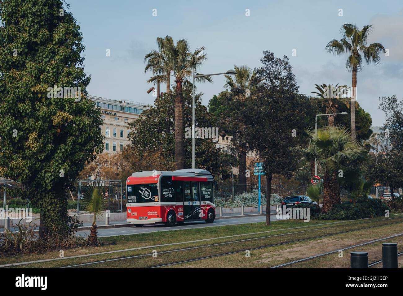 Nice, France - March 10, 2022: Free electric shuttle bus Coeur de Ville Navette (heart of the city shuttle bus) on a street in Nice, a famous tourist Stock Photo