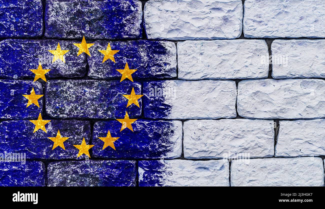 Flag of the European Union in front of a stone wall Stock Photo