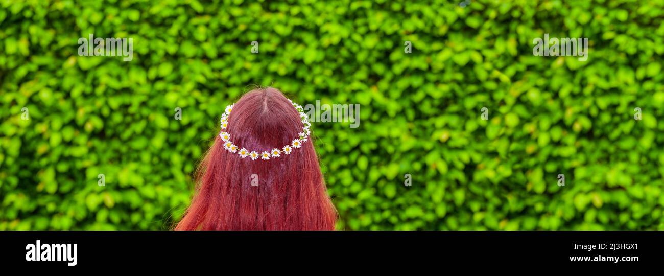 Woman with wreath of daisies in hair Stock Photo