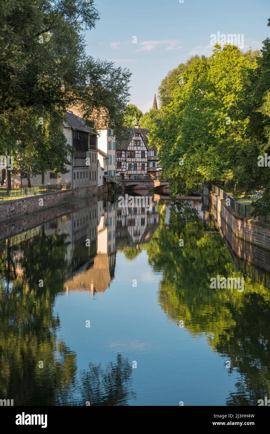 Strasbourg Alsace picturesque canal with half-timbered houses and reflection in water Stock Photo
