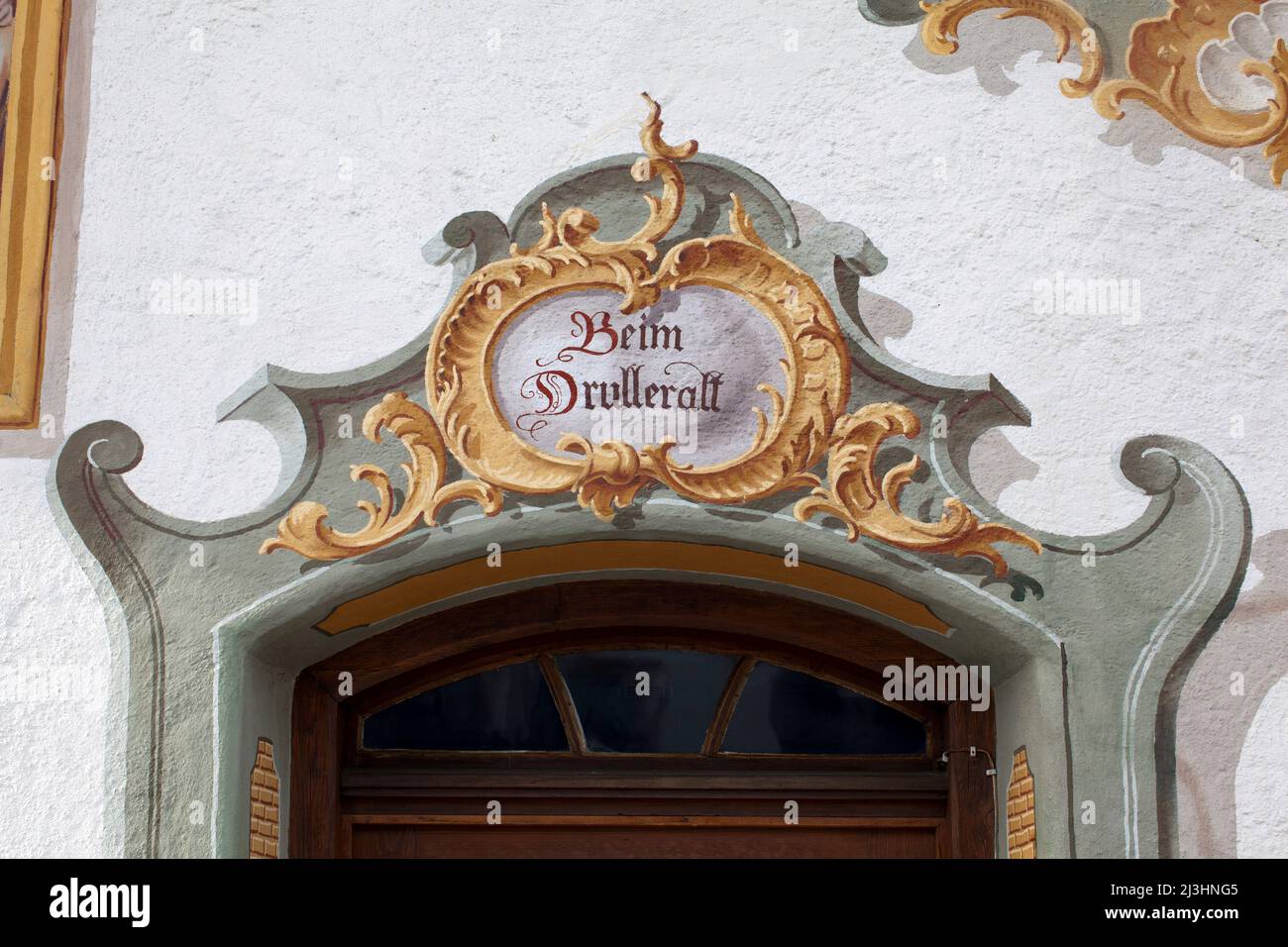 a special cultural asset is the traditional Lüftlmalerei in Mittenwald, old house with the house name 'Beim Drulleralt' whose builders originally came from the neighboring Tyrol. Built in the Kraut Gartl, a former field name Stock Photo