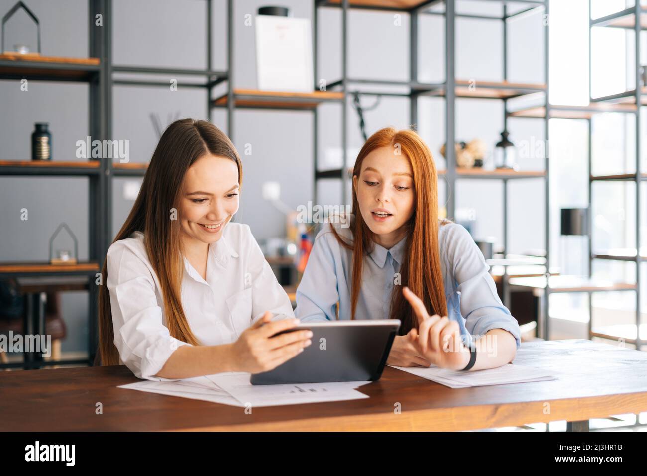 Video two beautiful women using hi-res stock photography and images - Alamy