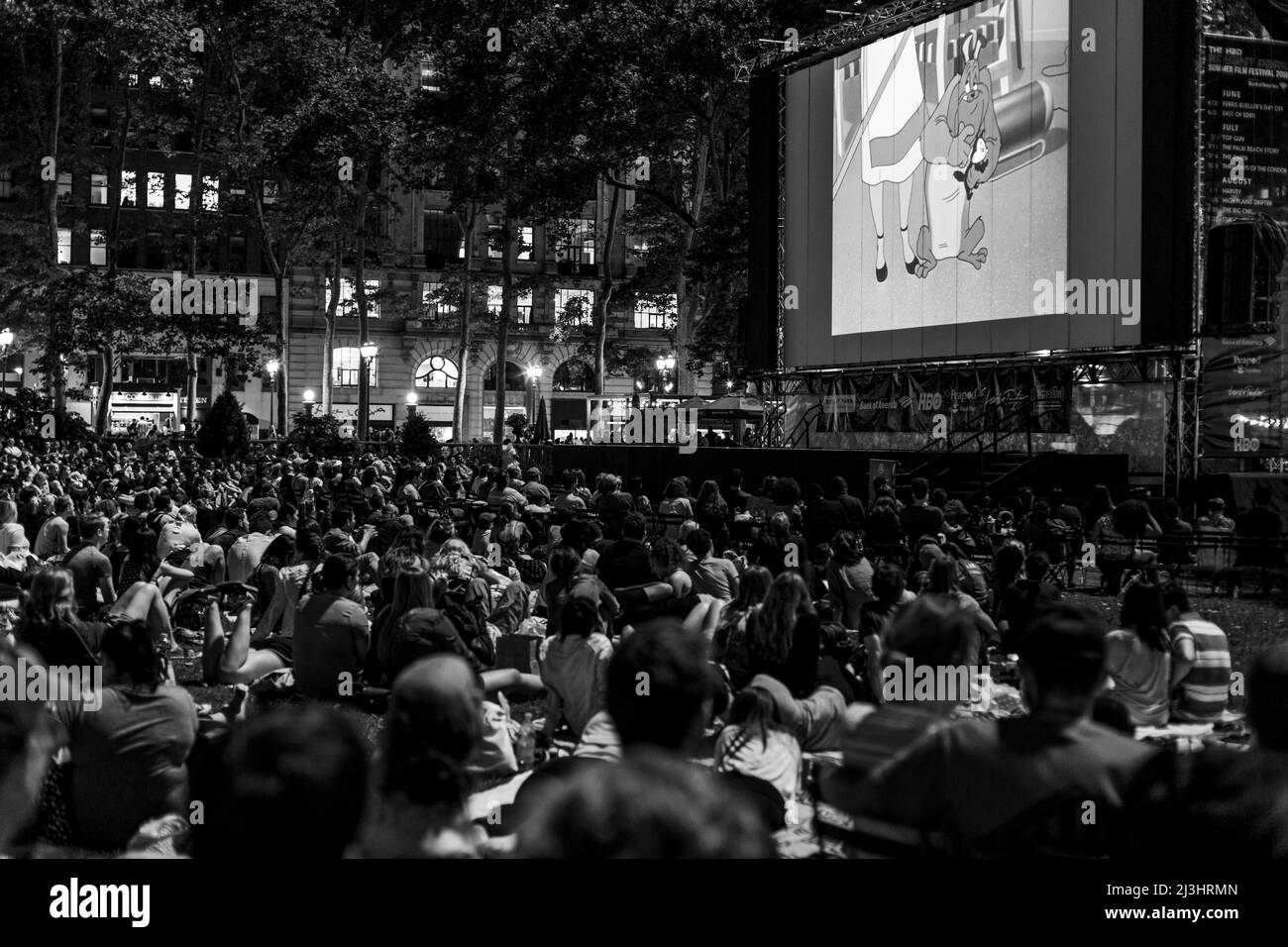 Bryant Park, New York City, NY, USA, Newyorkers and tourists enjoying the Bryant Park Summer Film Festival Stock Photo