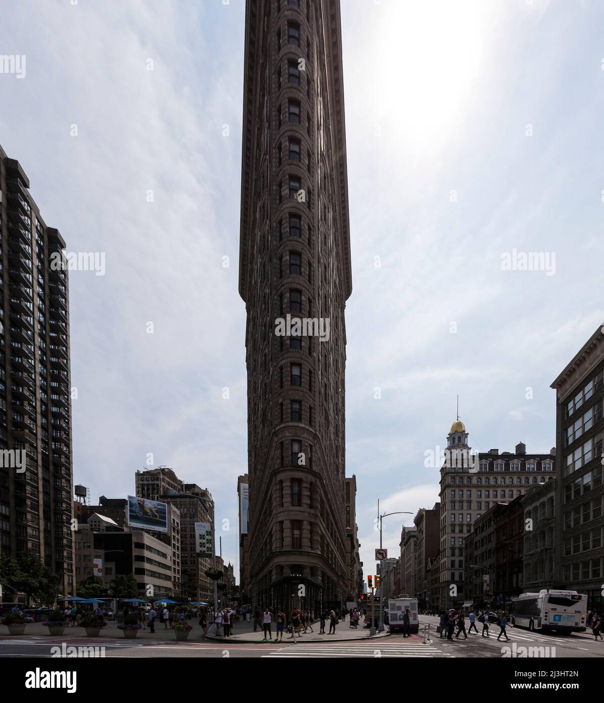 FLATIRON DISTRICT, New York City, NY, USA, Historic Flatiron or Fuller Building, a 22 Story triangular shaped steel framed Landmark located in Manhattan's Fifth Ave was completed in 1902. Stock Photo