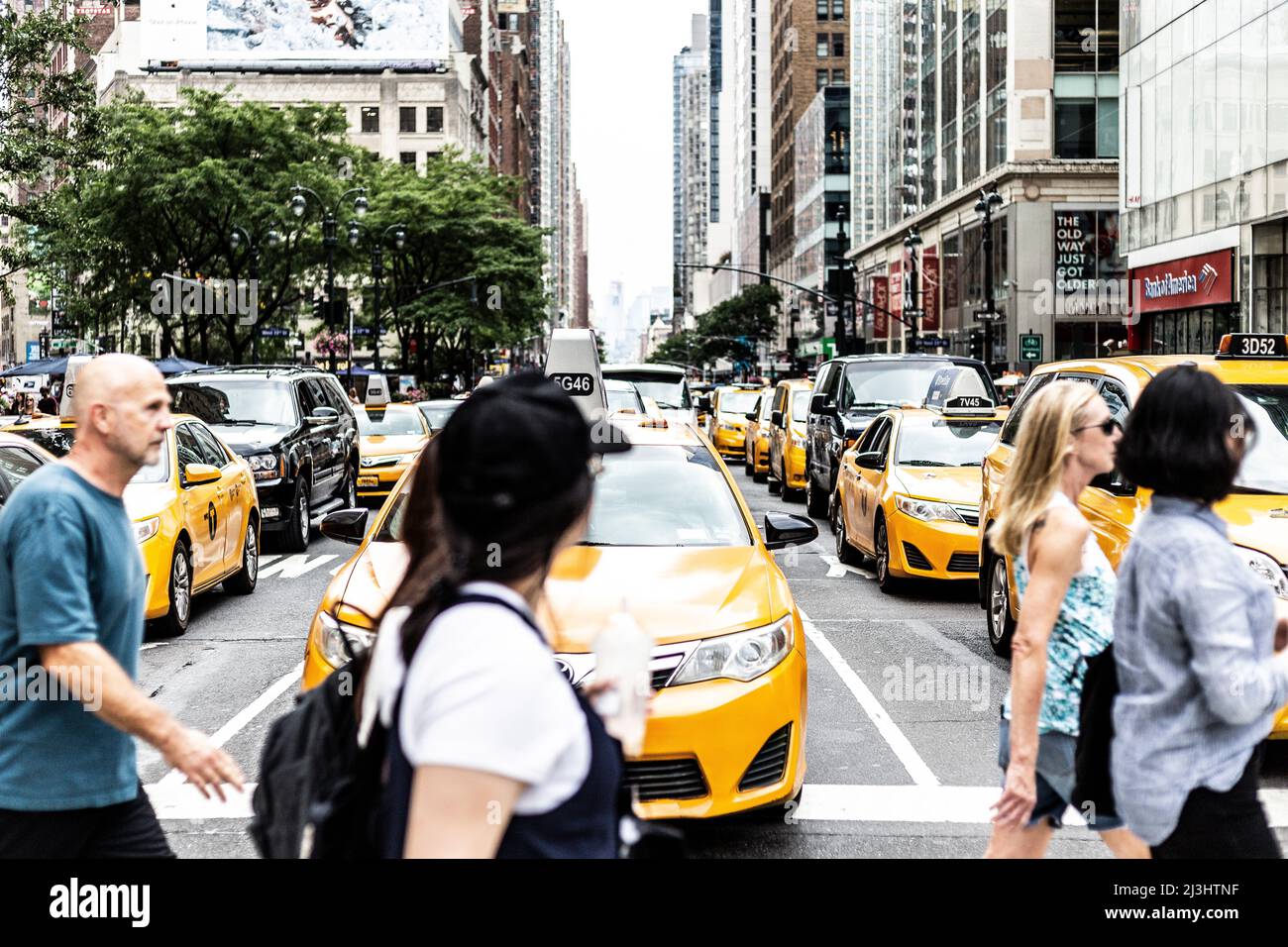 Midtown SOUTH, New York City, NY, USA, People crossing the street. Many Cabs Stock Photo