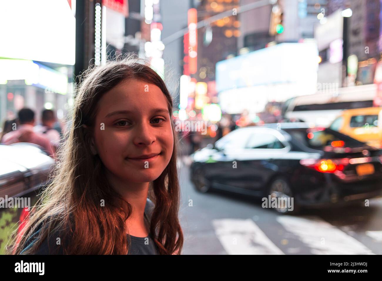 49 Street, New York City, NY, USA, 14 years old, caucasian teenager girl with brown hair at Times Square Stock Photo