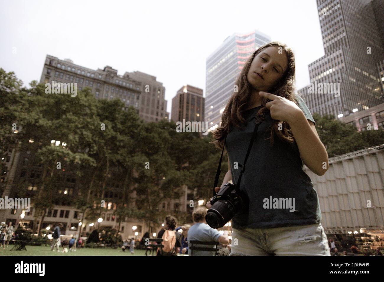 Midtown SOUTH, New York City, NY, USA, Young Girl posing in Bryant Park Stock Photo