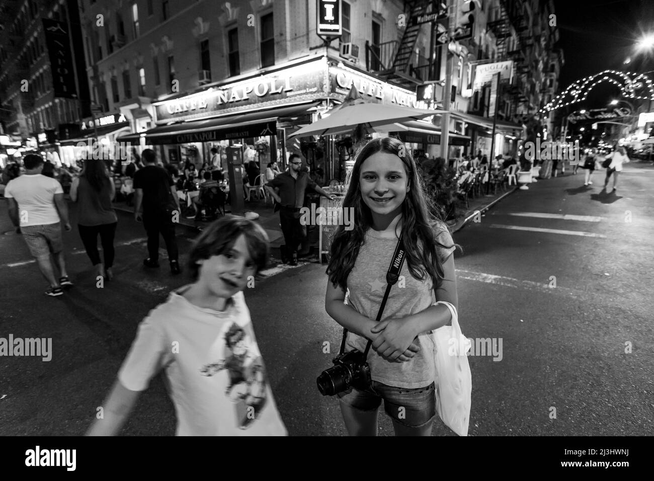 Little Italy, New York City, NY, USA, 14 years old caucasian teenager girl and 12 years old caucasian teenager boy - both with brown hair and summer styling in Little Italy Stock Photo
