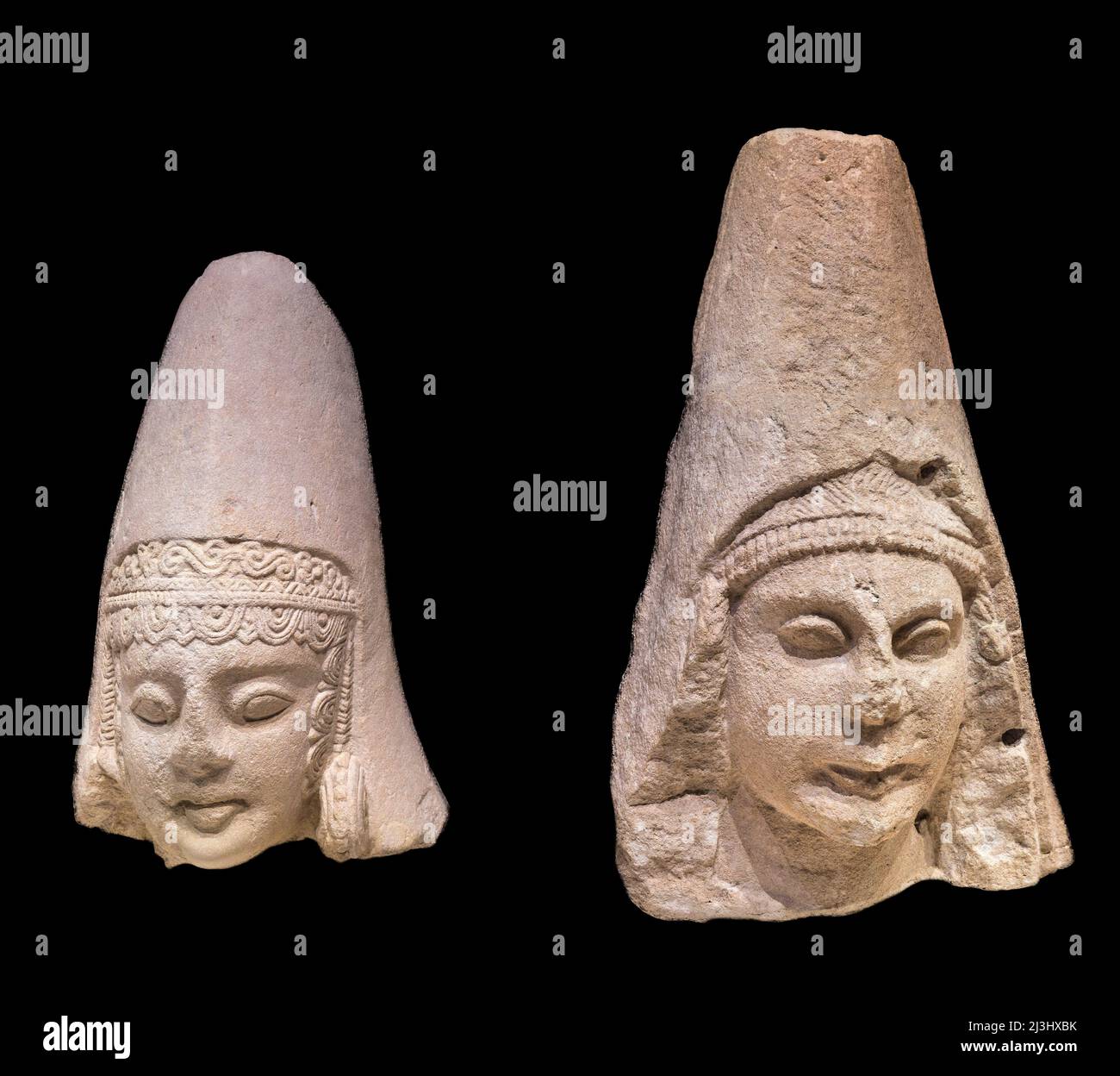 Carved limestone,  female heads from the 2nd, 3rd, century BC, Iberian Culture. From the shrine of Cerro do los Santos at Monteallegre del Castillo, A Stock Photo