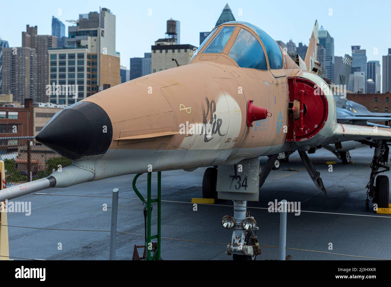12 AV/W 46 ST, New York City, NY, USA, Israel Aircraft Industries Kfir C-2 1976 on Intrepid Sea, Air & Space Museum - an american military and maritime history museum showcases the aircraft carrier USS Intrepid. Stock Photo