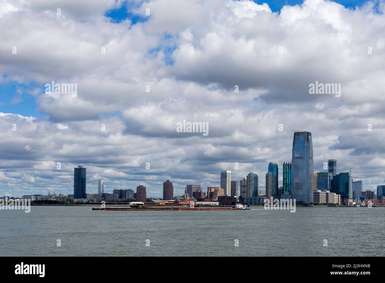 MANHATTAN, New York City, NY, USA, View on Ellis Island in New York harbor, famous island where new immigrants had a place to enter USA, land of freedom. Stock Photo