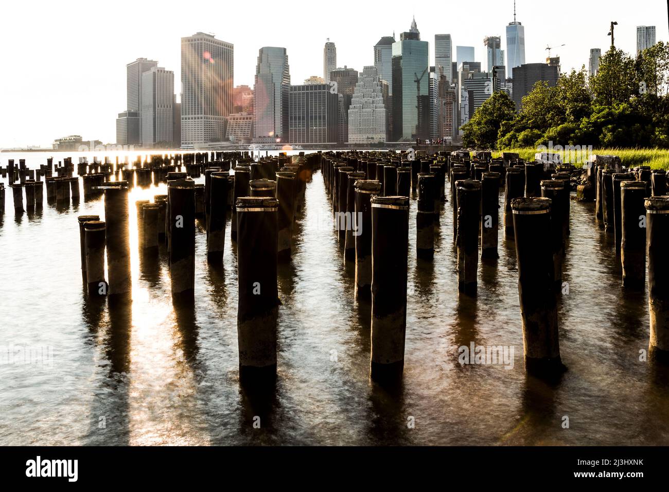 Skyline and brooklyn bridge as seen from brooklyn pier hires stock