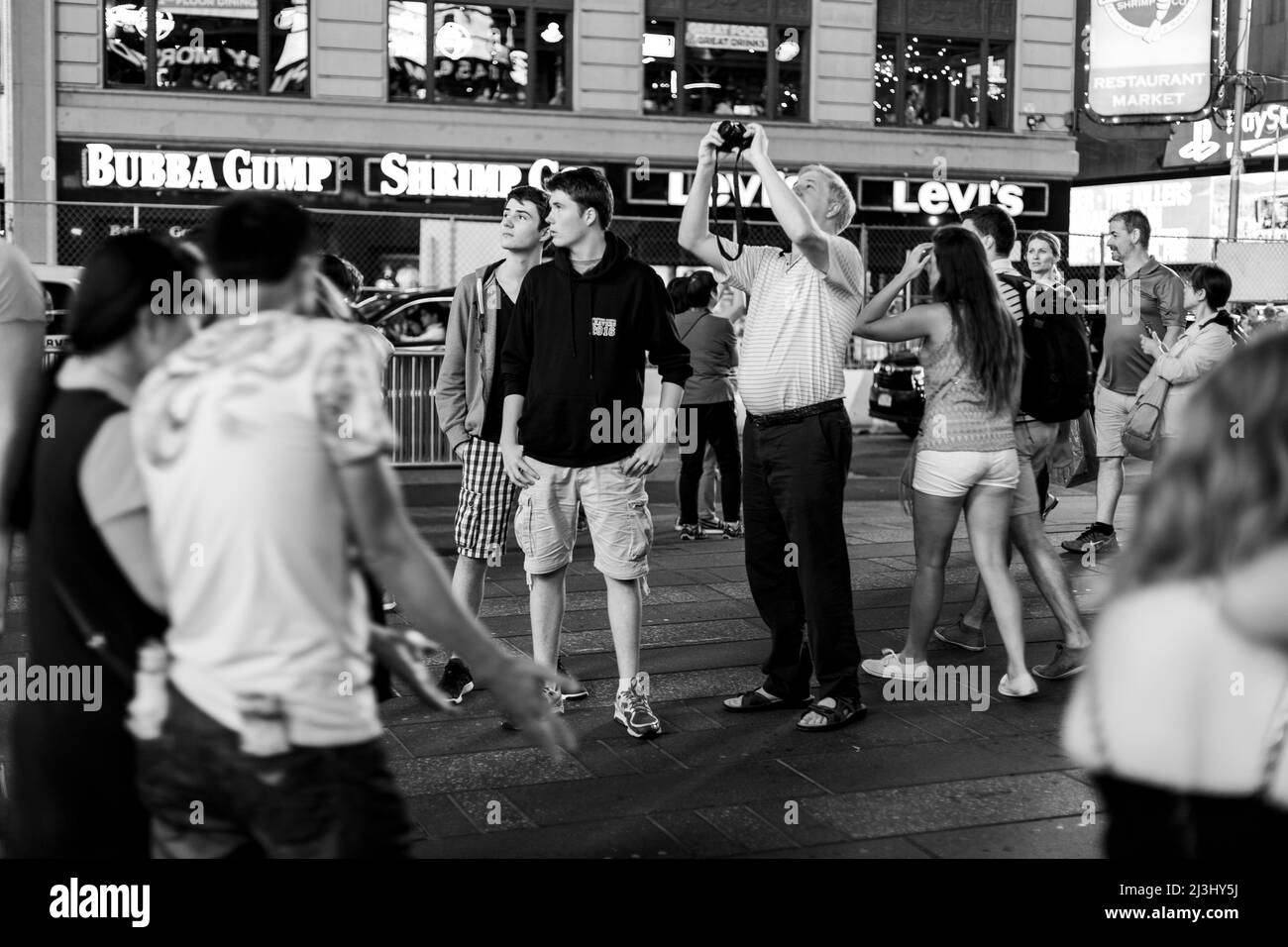 Theater District, New York City, NY, USA, Lots of people on the street at night on times square Stock Photo